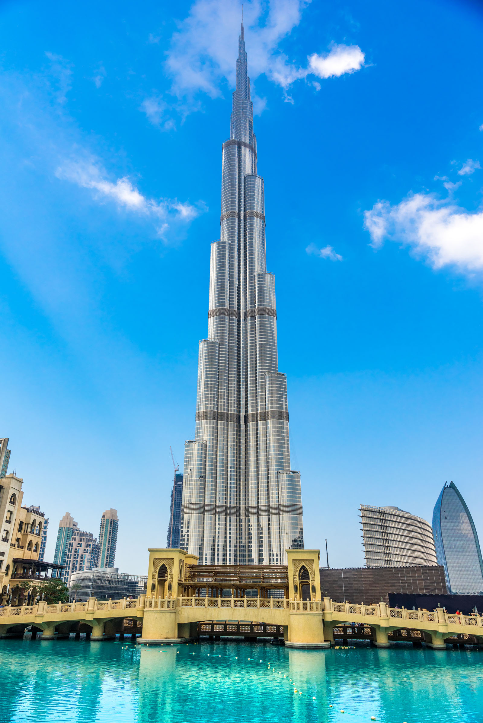 Dubai, United Arab Emirates - February 10, 2014: view of The Burj Khalifa or Burj Dubai. At 828 meters (2,717 feet), the Burj Khalifa, formerly known as the Burj Dubai, currently holds the record for tallest building and tallest human-built structure in the world. Adrian Smith and Skidmore, Owings & Merrill (SOM) designed the tower